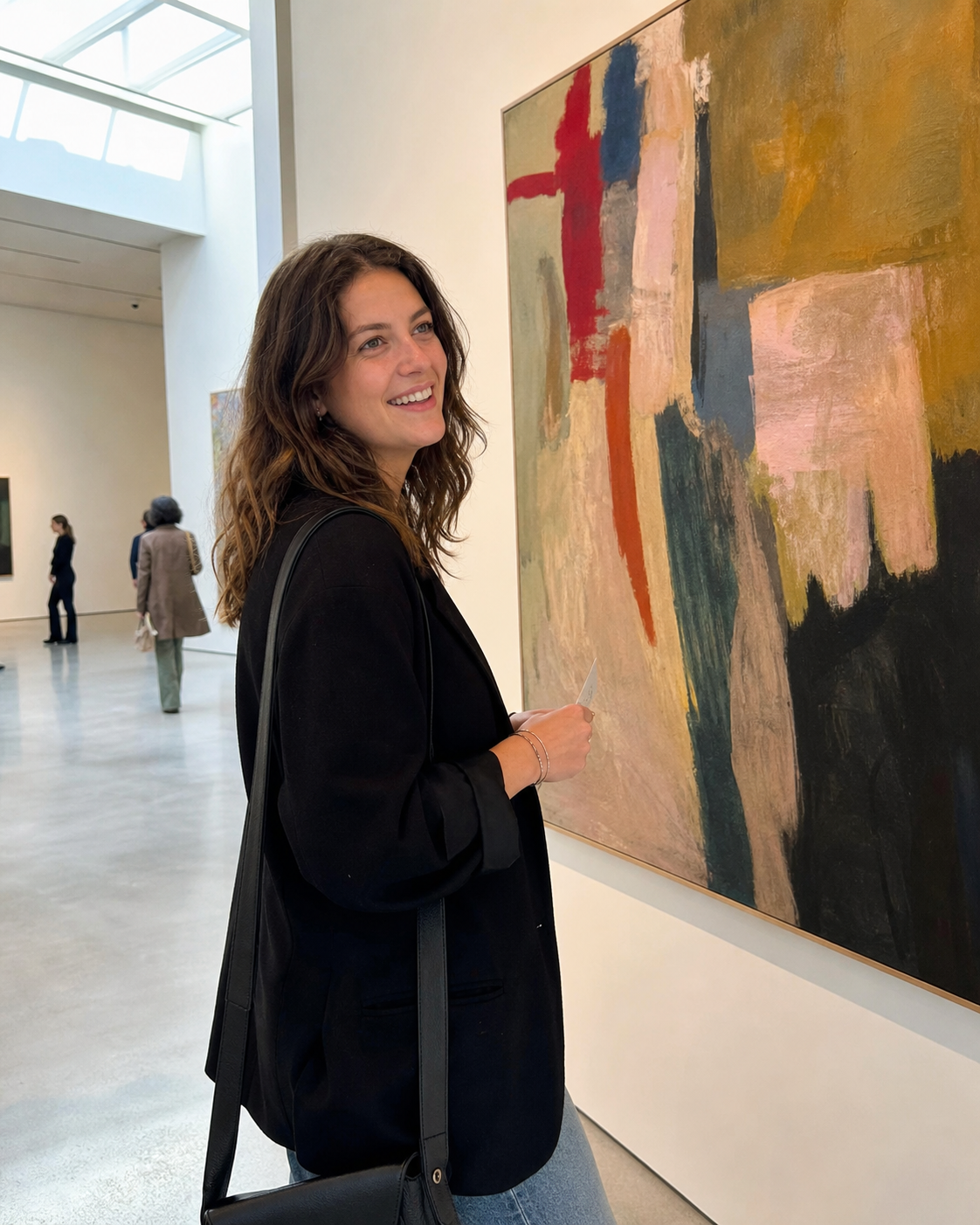 Woman standing in a gallery
